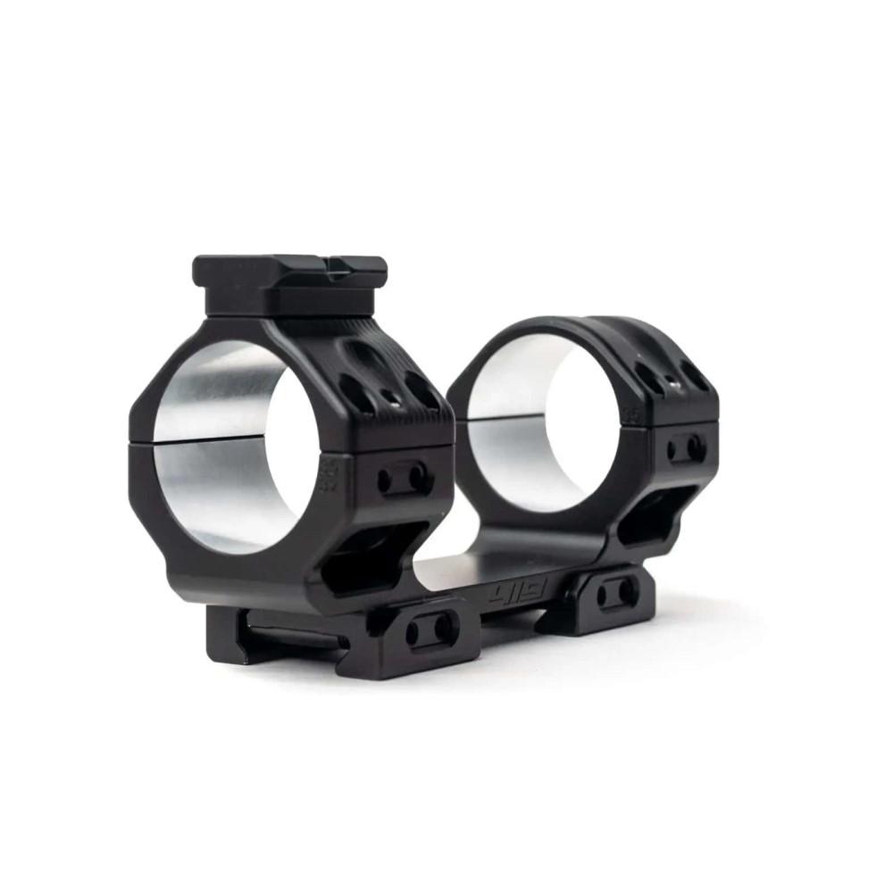 Black dual-ring rifle scope mount on white background