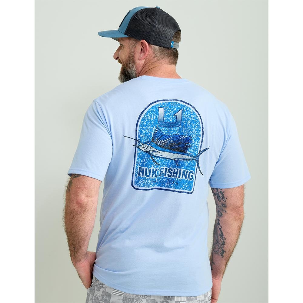 Man wearing light blue Huk Fishing T-shirt