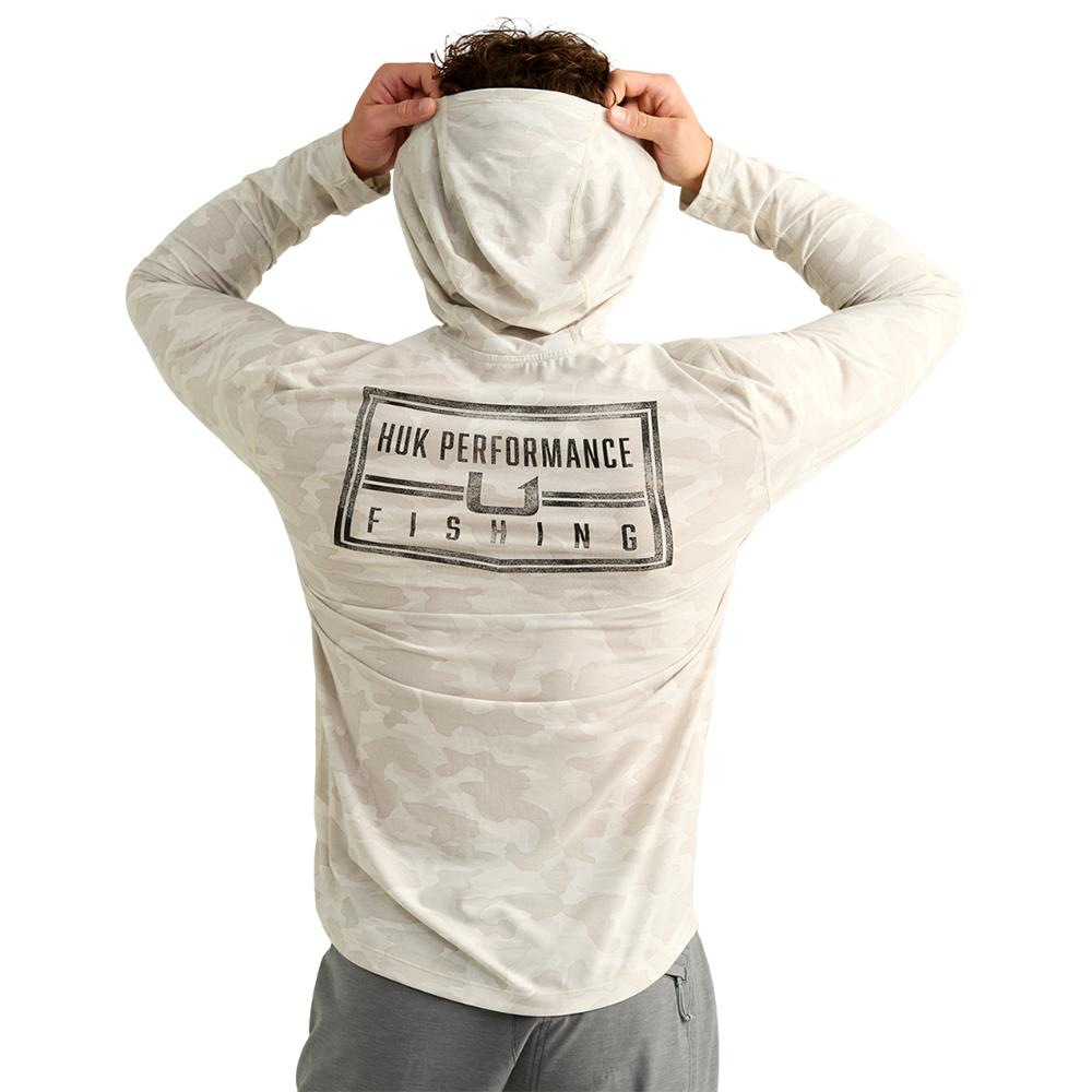Man wearing Huk Performance Fishing camo hoodie