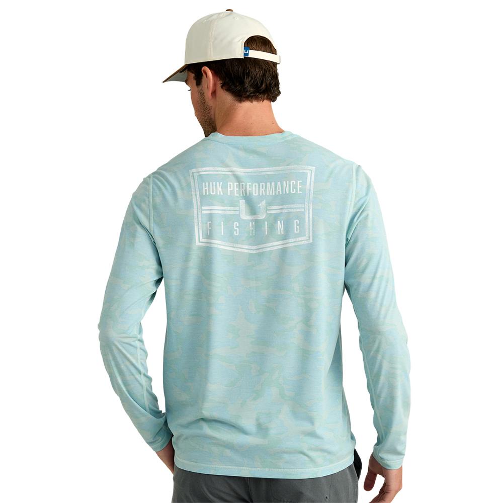 Man wearing light blue fishing performance shirt