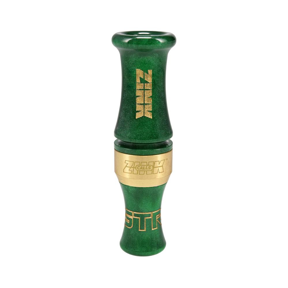 Green and gold duck call on white background