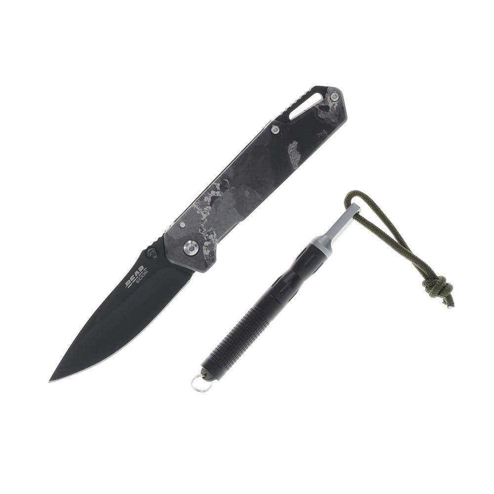 Folding knife and sharpening rod on white background
