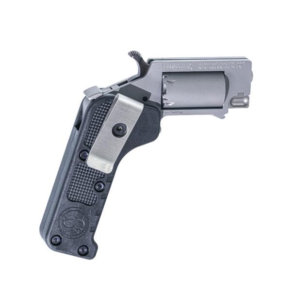 Compact silver and black revolver on white background