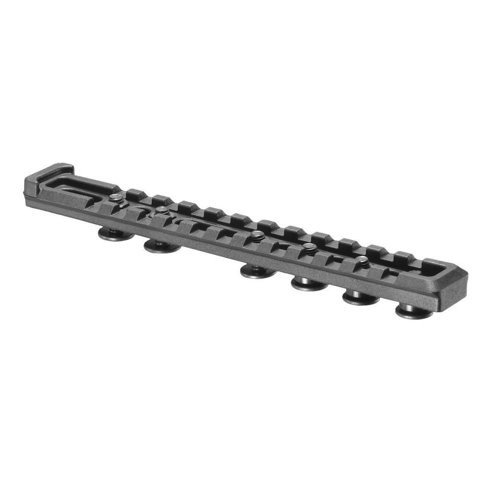 Black tactical rail for mounting accessories.