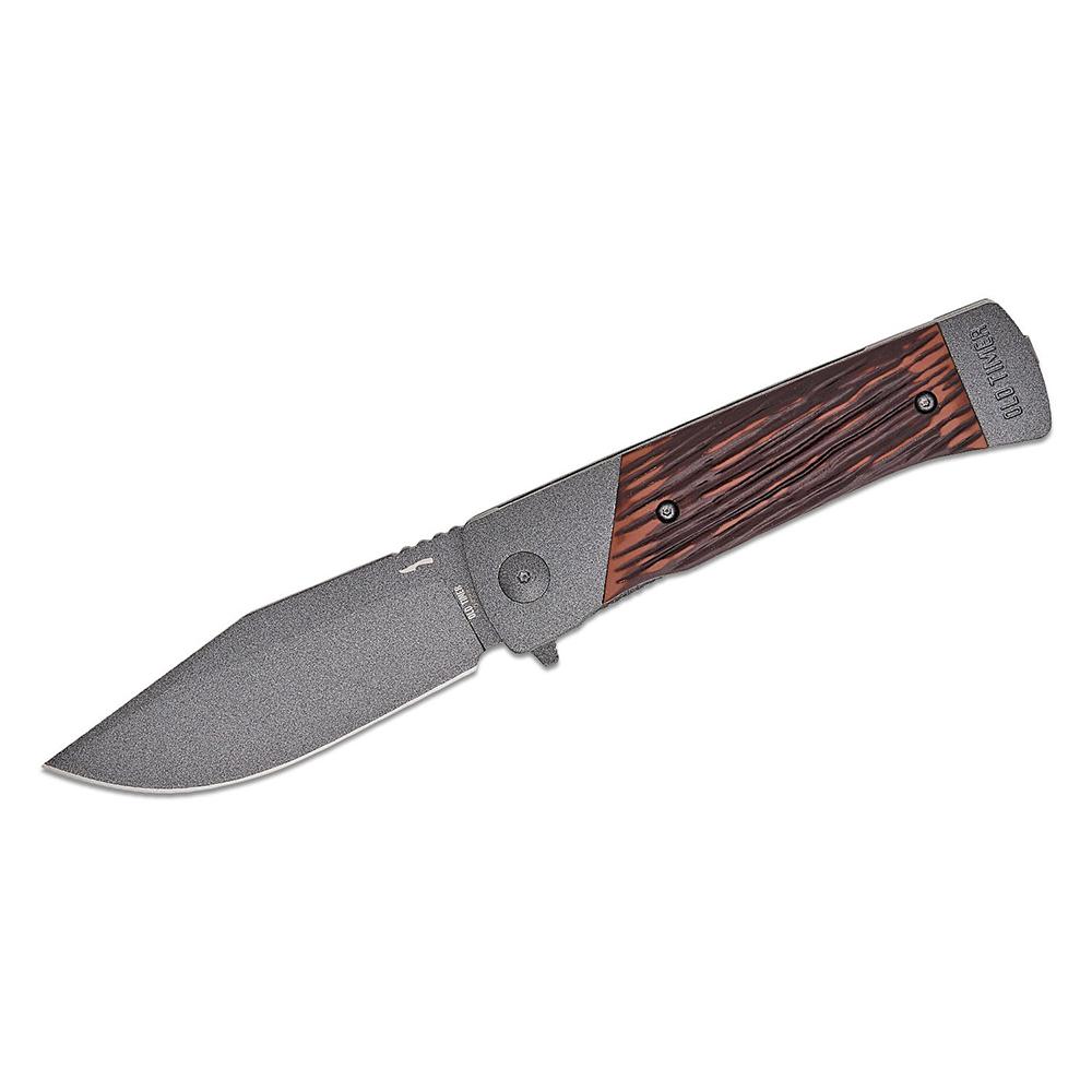 Folding knife with textured blade and wood handle