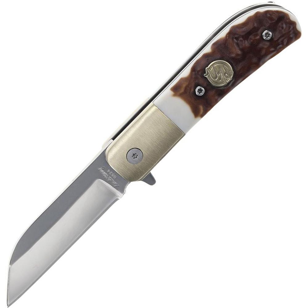 Partially open folding pocket knife with brown handle