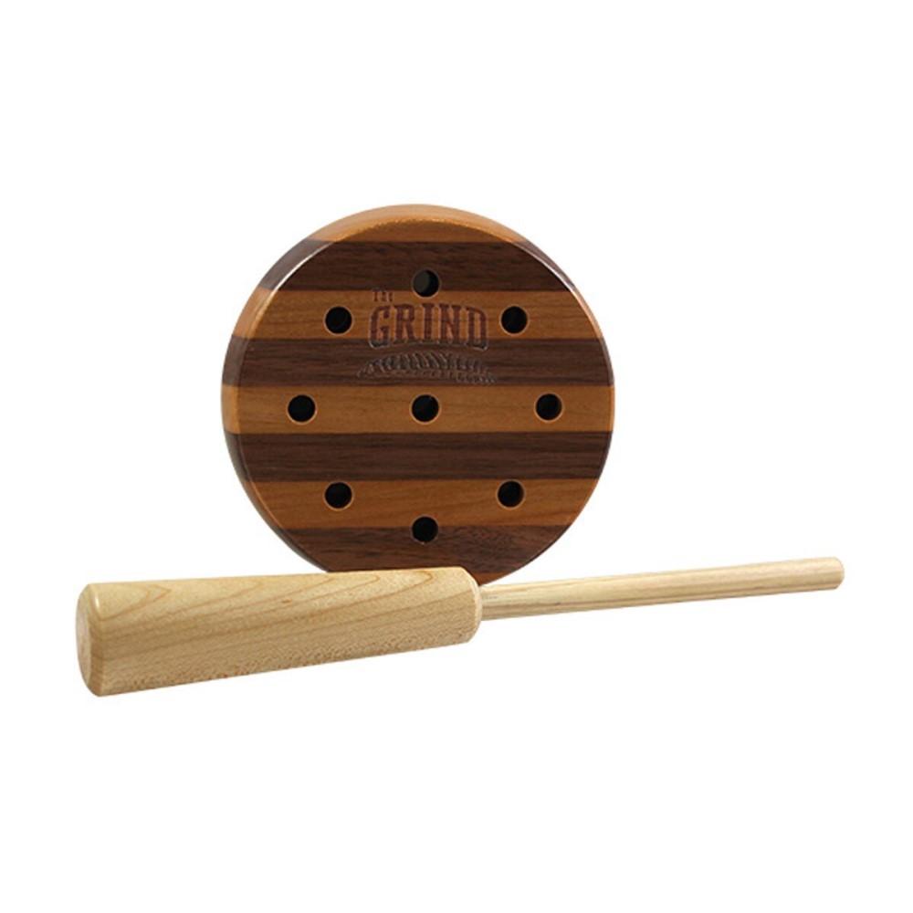 Wooden target board with holes and bat