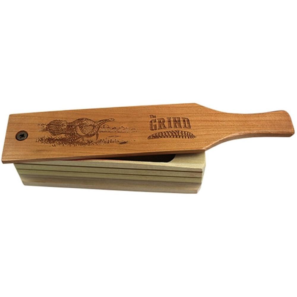 Wooden duck call with engraved design