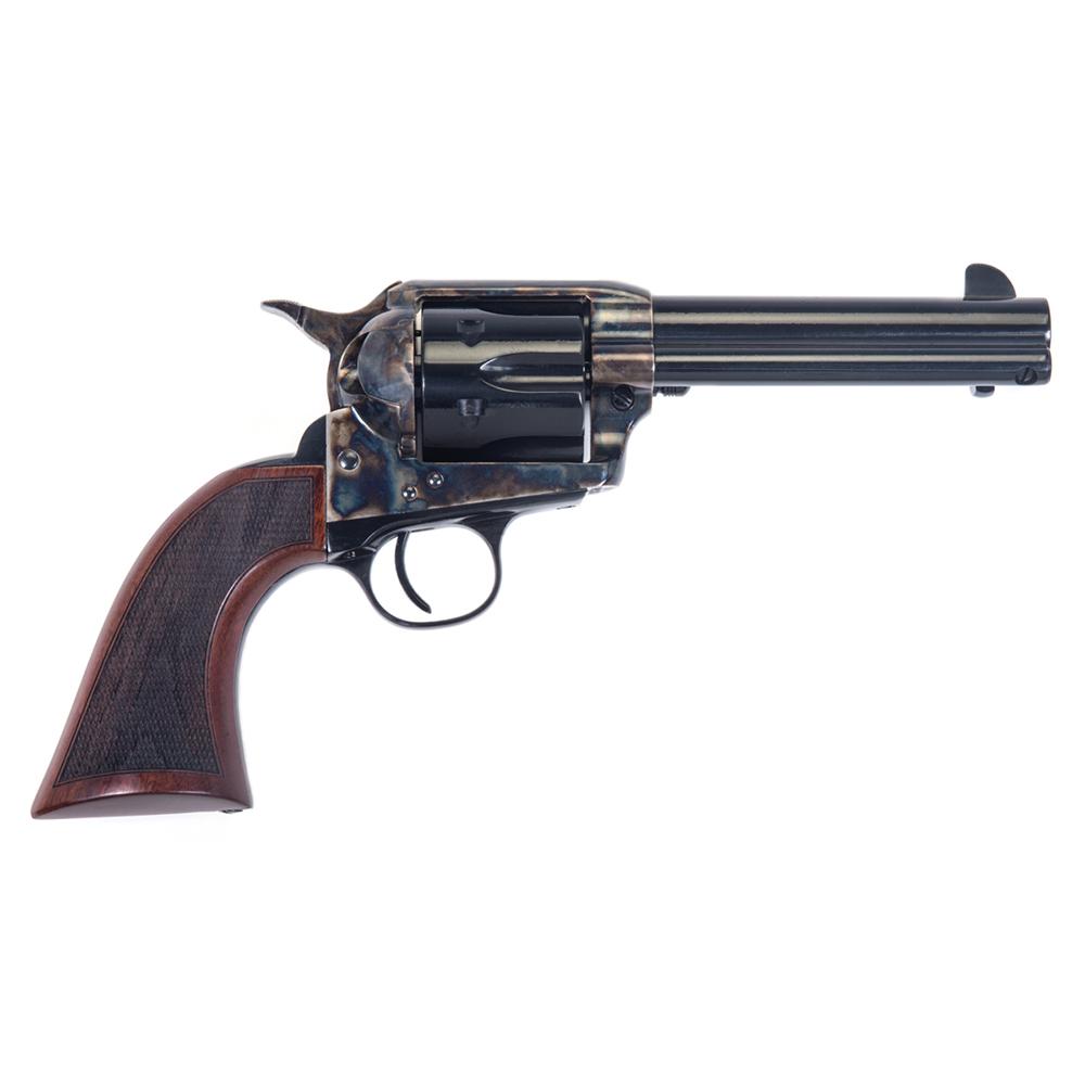 Vintage revolver with wooden grip on white background