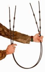 Person holding resistance band handles against white background