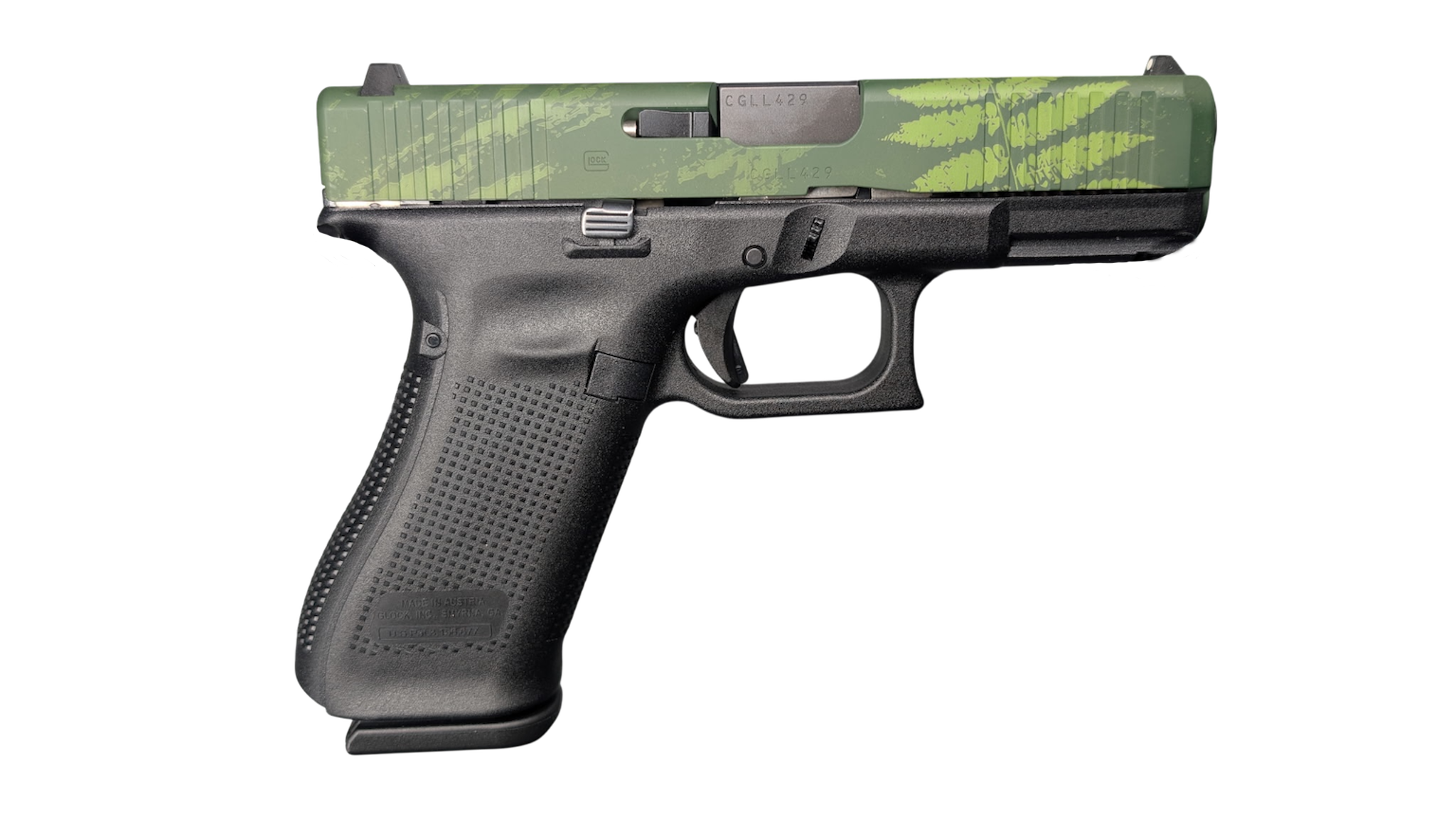 Black handgun with green camo slide