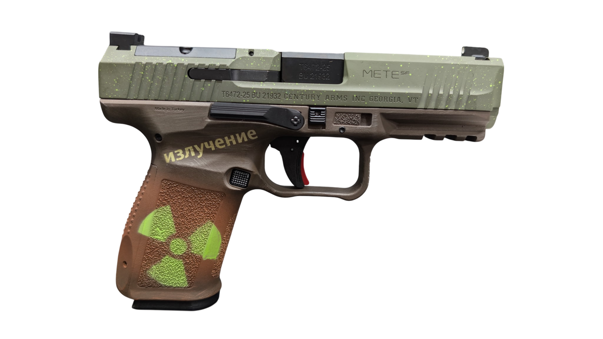Customized handgun with green slide and radiation symbol