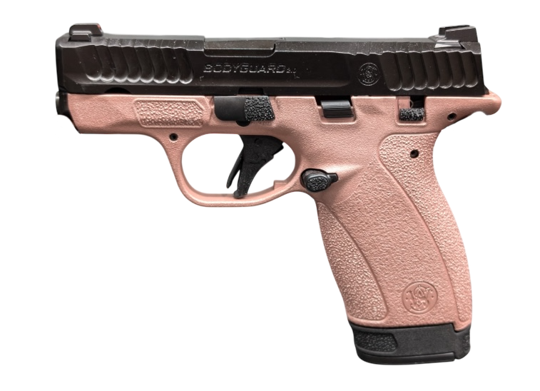 Compact semi-automatic pistol with black slide and tan grip