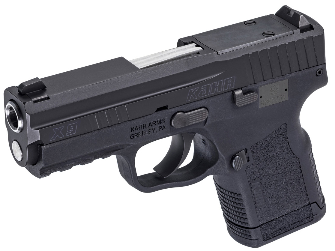 Kahr X9 compact semi-automatic pistol on white background