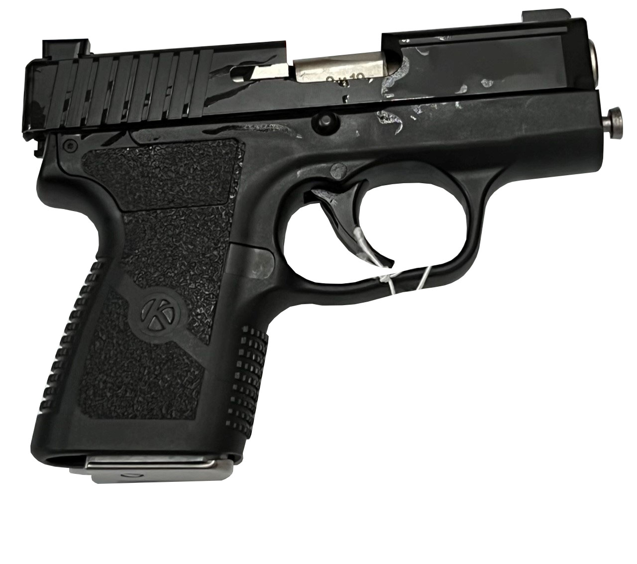 Black semi-automatic handgun on white background