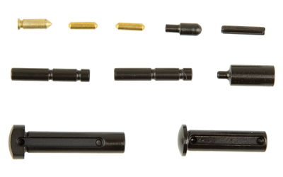 Various metal pins and fasteners on white background