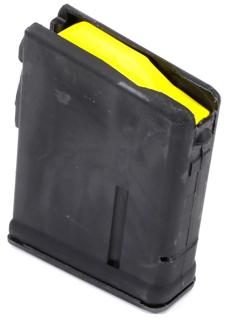 Black rifle magazine with yellow follower