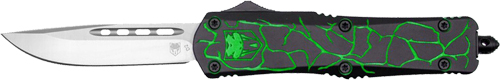 Green and black handled folding knife