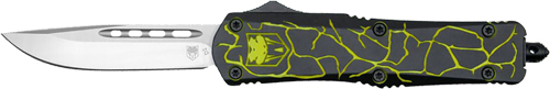 Black and green folding knife with silver blade