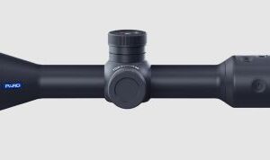 Black rifle scope on white background