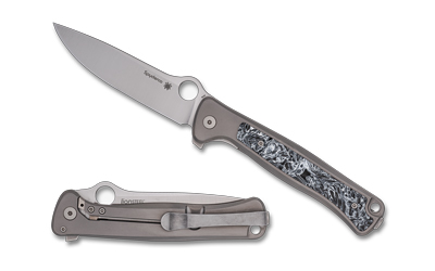 Open and closed folding knife with patterned handle