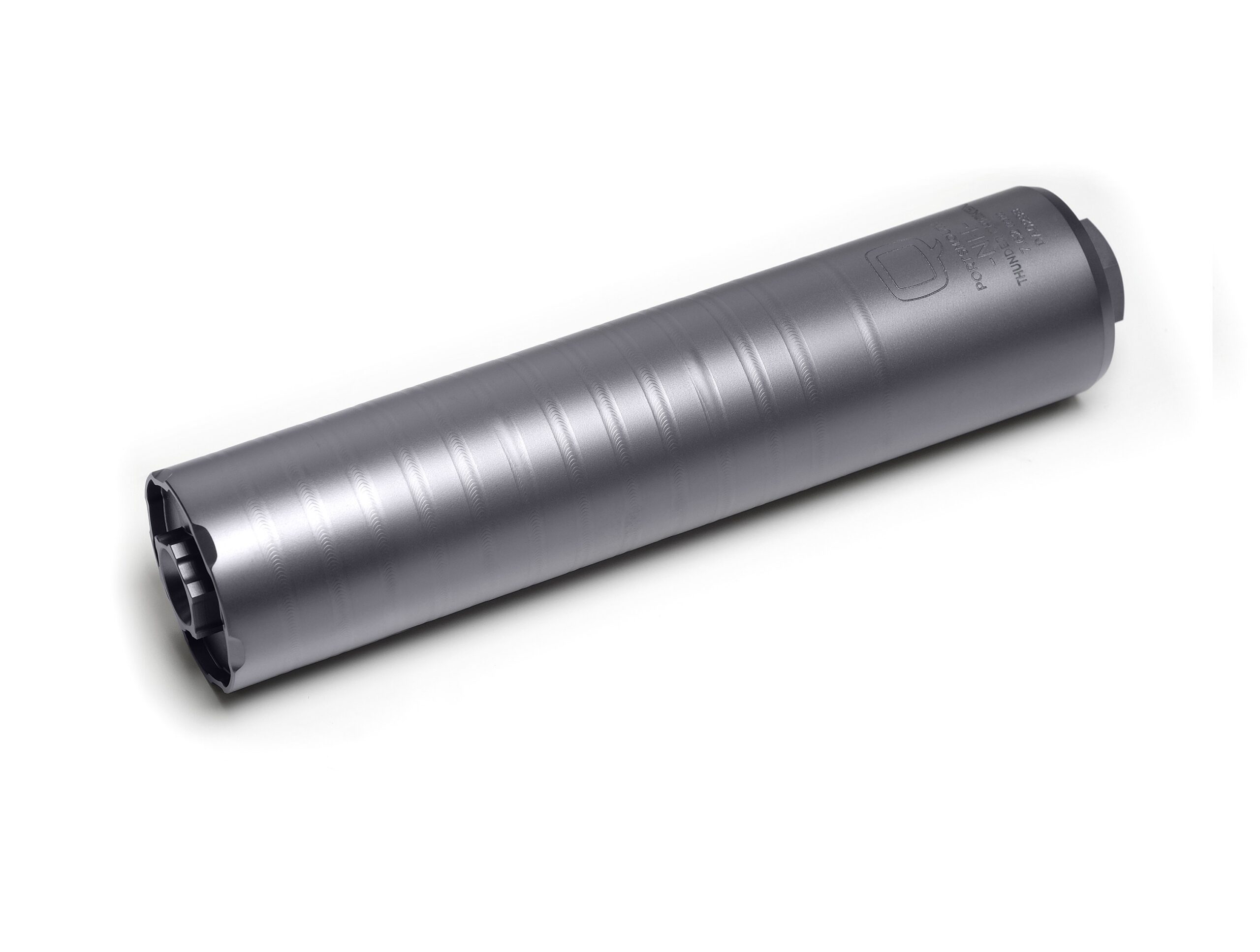Gray metal cylindrical firearm suppressor on white background
