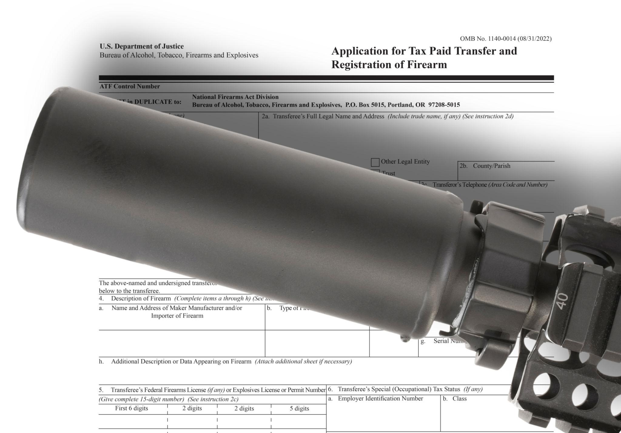 Rifle suppressor over ATF firearm registration form