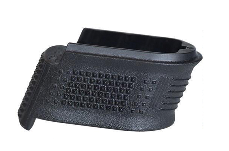 Black handgun magazine grip extension base plate