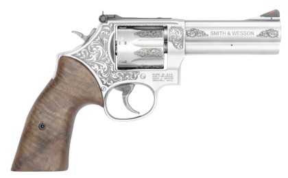 Engraved Smith and Wesson revolver with wooden grip