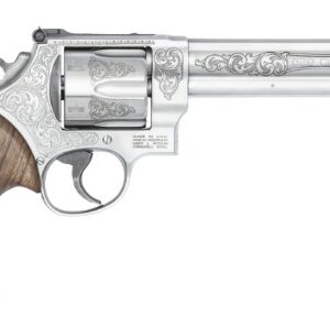 Engraved silver revolver with wooden grip