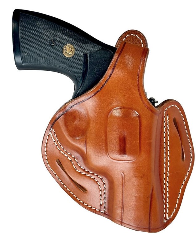 Revolver in brown leather belt holster