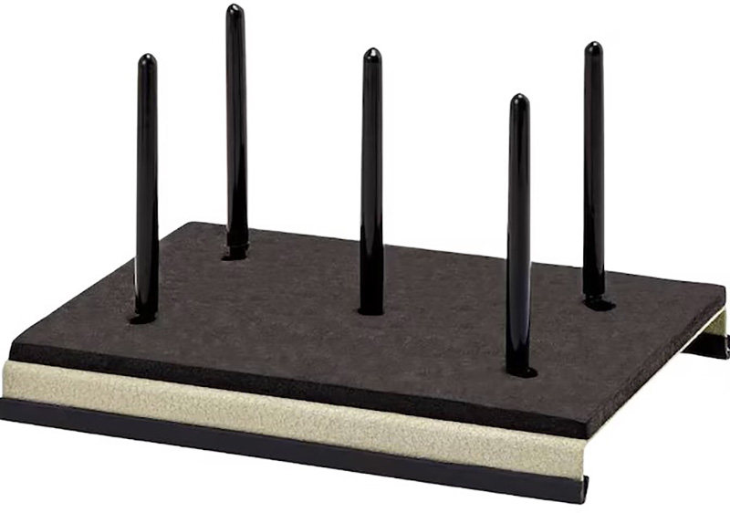 Black boot scraper with five vertical pegs