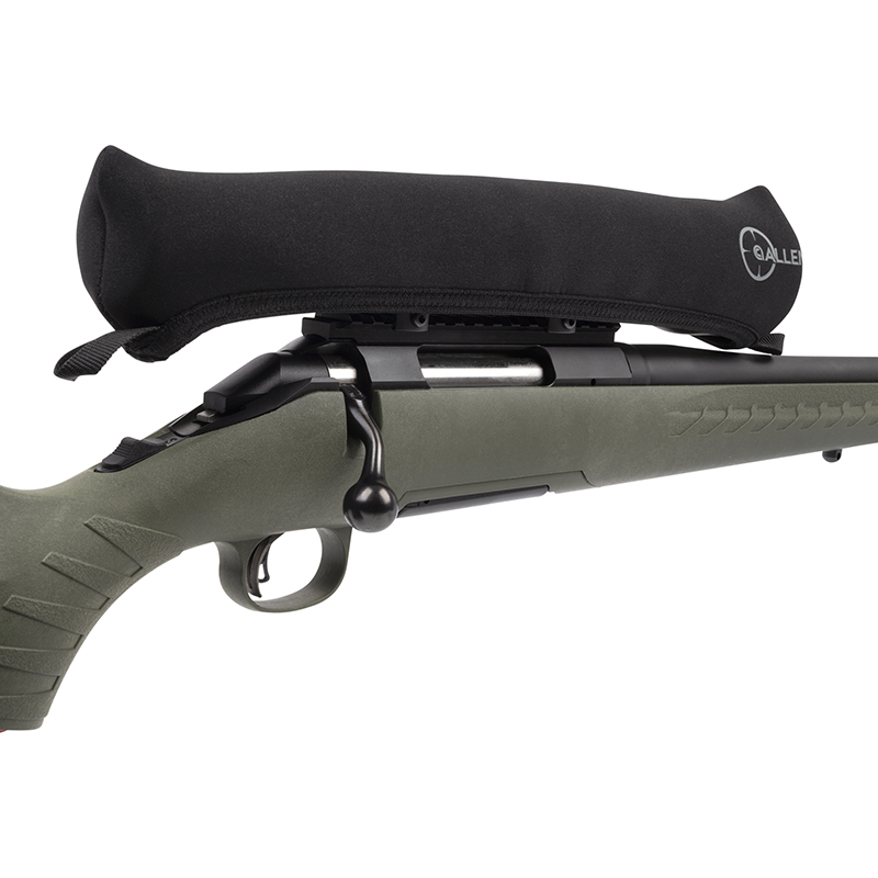 Bolt-action rifle with padded cheek rest attachment