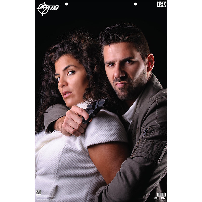 Man holding woman at gunpoint against dark background