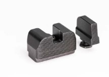 Two black metal firearm rear sights