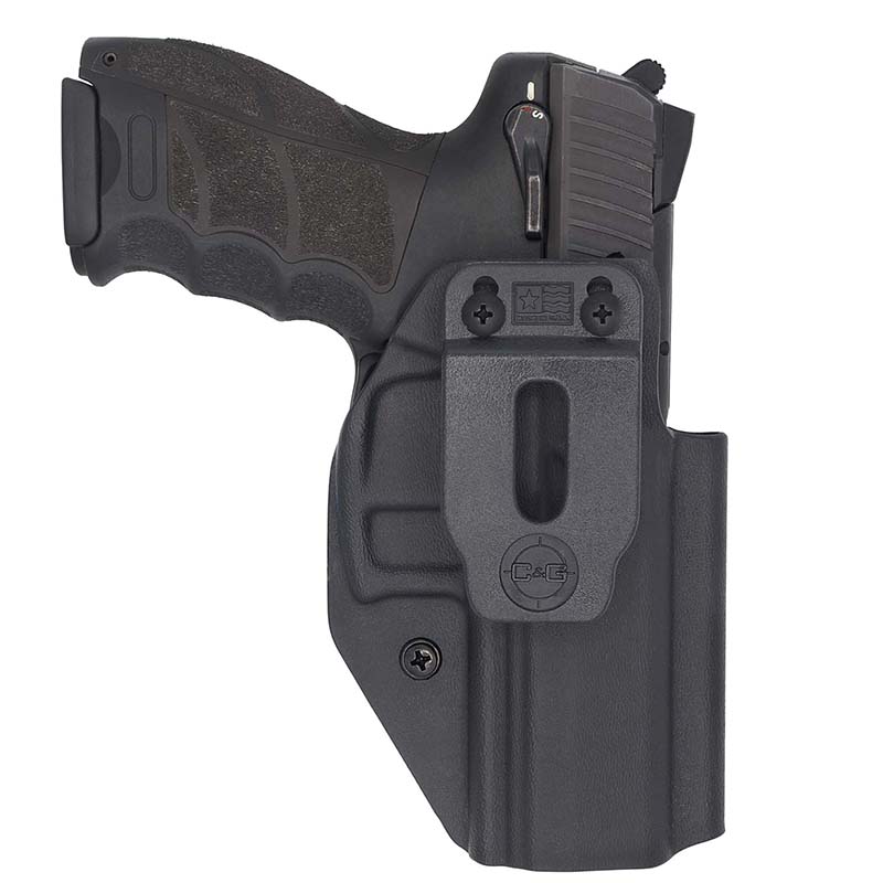 Handgun in black concealed carry holster