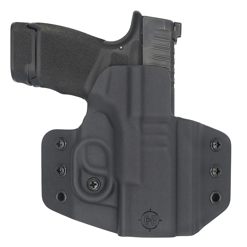 Handgun in black polymer holster