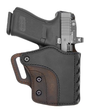 Handgun in black leather holster