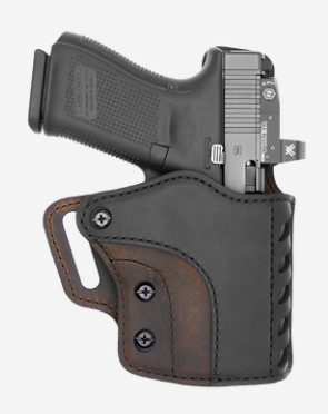 Handgun in black and brown leather holster