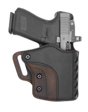 Handgun in black and brown leather holster