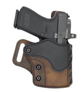 Handgun in brown leather holster