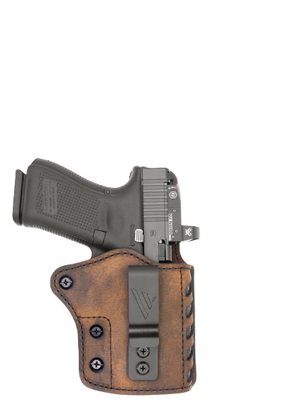 Handgun in brown leather holster