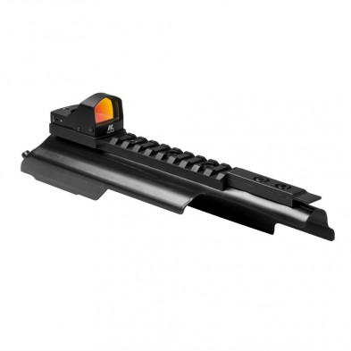 Red dot sight mounted on firearm rail