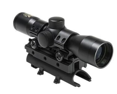 Black tactical rifle scope with rail mount