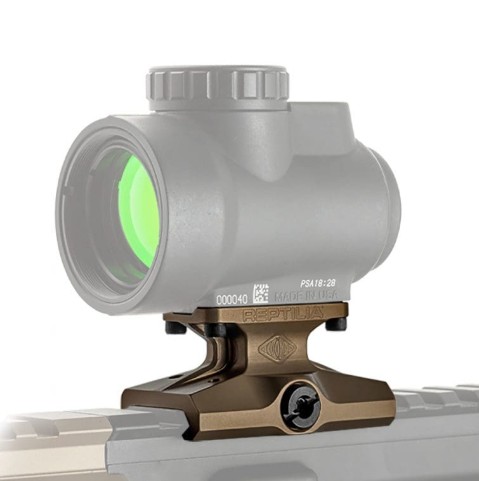 Red dot sight mounted on rifle rail