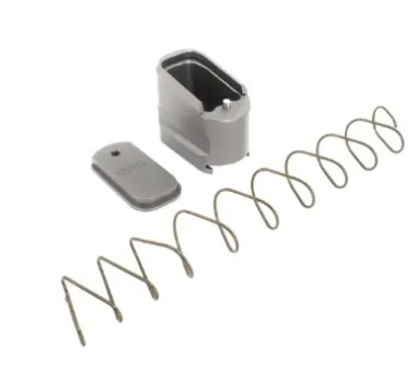 Disassembled metal firearm magazine with spring and baseplate