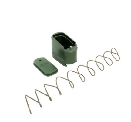 Disassembled handgun magazine with spring and base plate