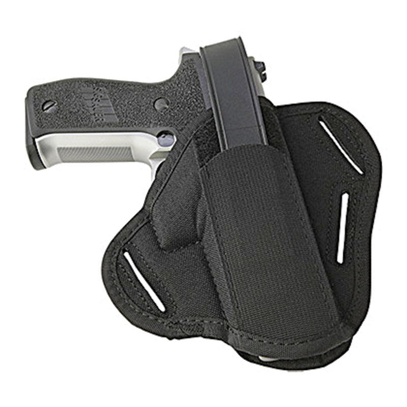 Handgun secured in black belt holster