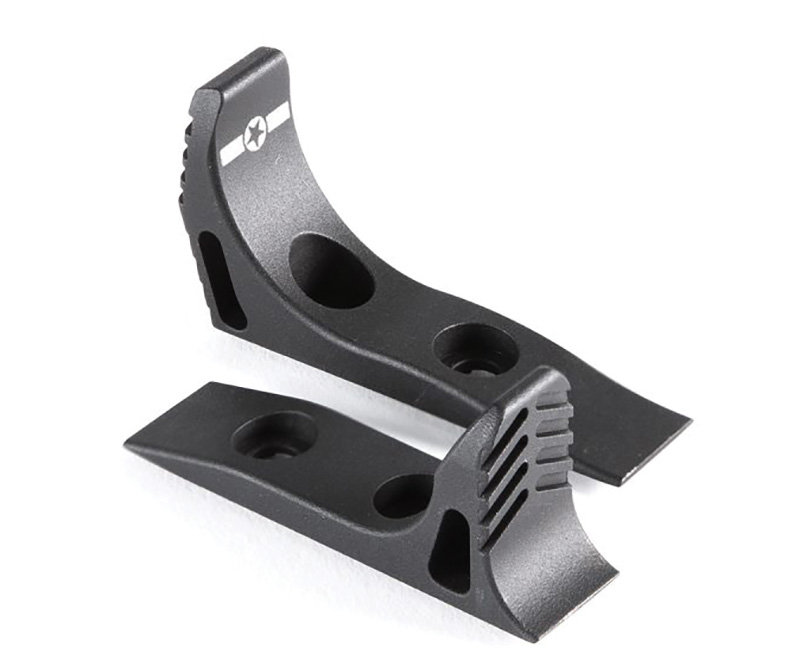 Black metal mounting brackets with screw holes
