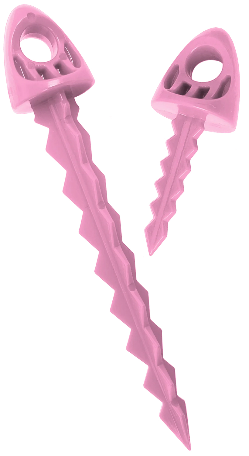 Two pink plastic wall anchors with loop heads